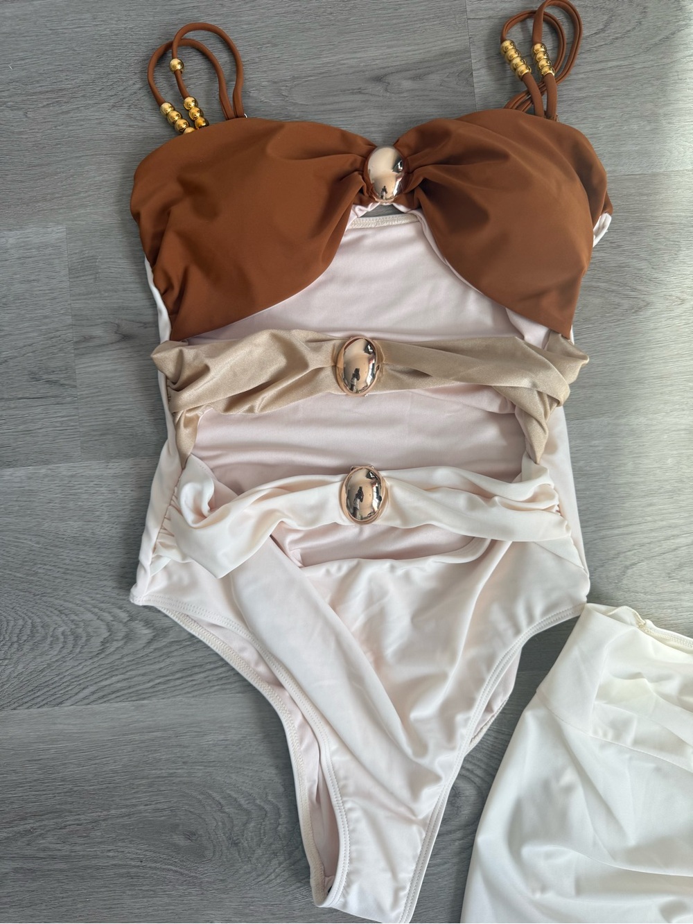Colorblock Brown and Cream One-Piece Swimsuit with Gold Accents